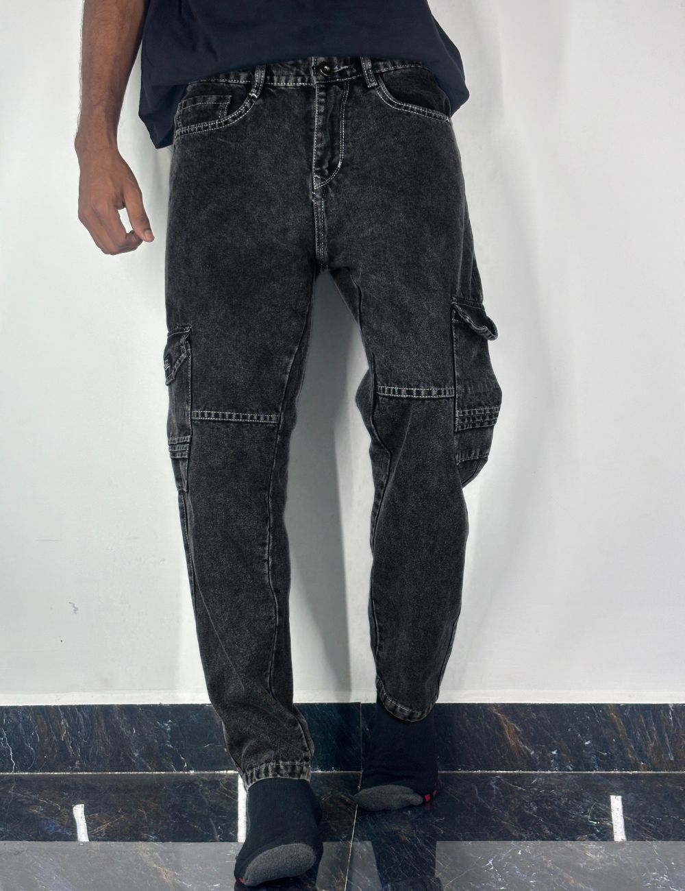 Pair of dark Black jeans on a white background