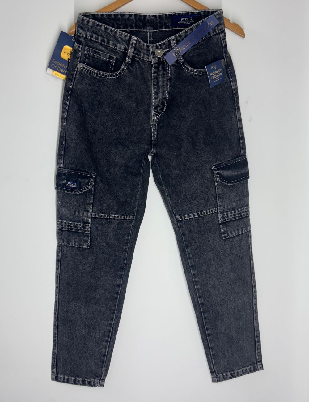 Pair of dark Black jeans on a white background